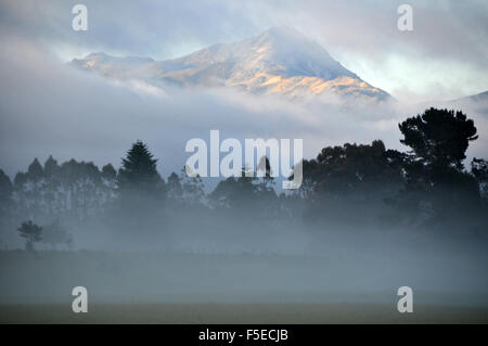 Misty mountain around Manapouri, Fiordland National park, Southland, South Island, New Zealand Stock Photo