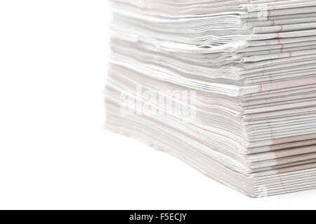 newspaper magazines stack on white Stock Photo