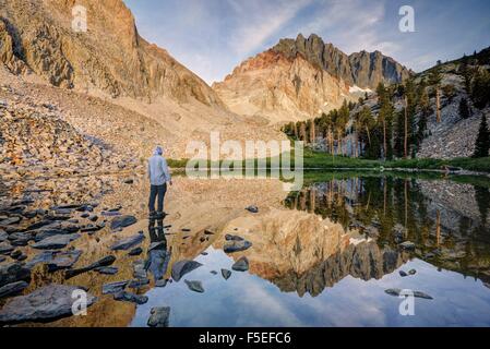 Man standing by Lake, Inyo National Forest, California, United States Stock Photo