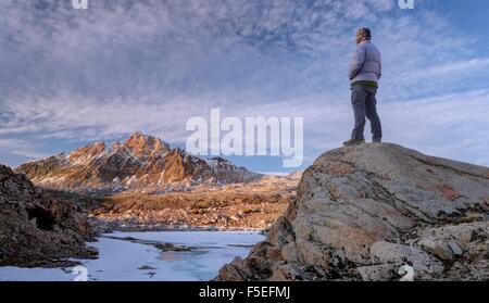 Man looking at mount humphreys, Sierra National Forest, California, USA Stock Photo