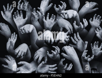 Close-up of hands reaching out Stock Photo