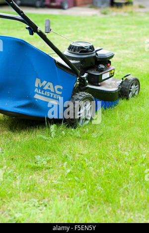 MacAllister petrol mower on a lawn Stock Photo