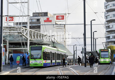 Trams outside East Croydon Railway station public transport Surrey UK Stock Photo
