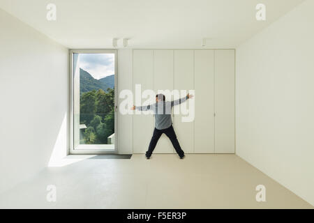 Architecture, new house interior,  room with a man inside Stock Photo