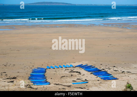 surf boards on the beach in ballybunion ready for a surf schools lessons Stock Photo