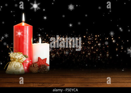Composite image of christmas candles Stock Photo