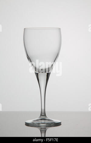 Empty glass of wine on white background Stock Photo