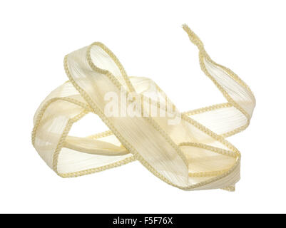 A small length of sheer ivory ribbon cloth with a binding stitch unfolded isolated on a white background. Stock Photo