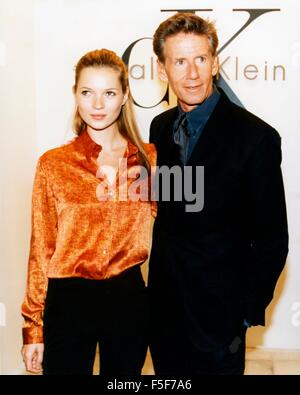 Oct 10, 1996 - Hong Kong, Hong Kong - Model KATE MOSS and designer CALVIN KLEIN at Klein's China flagship CK store, opening in Hong Kong. Katherine Moss (born 16 January 1974) is a British supermodel who was once the face of Calvin Klein. She was born in Addiscombe, London Borough of Croydon, England. Moss was discovered at the age of 14 by Sarah Doukas (the founder of Storm Model Agency) in 1988, at JFK Airport in New York City. Moss then went on to become the anti-supermodel of the 1990s. Despite this apparent disadvantage, Moss charmed the fashion industry and has walked/campaigned for such Stock Photo