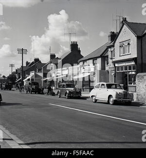 1950s historical, High street, Cowley, Oxford, home of the Pressed Steel Company, at the time, the largest in Europe. Stock Photo