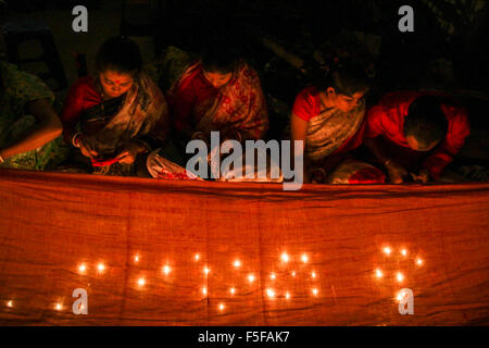 Dhaka, Bangladesh. 03rd Nov, 2015. Bangladeshi Hindu devotees lighting lamps to observe Rakher Upobas at Baba Loknath Ashrom. Credit:  Belal Hossain Rana/Pacific Press/Alamy Live News Stock Photo