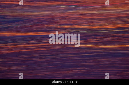 Abstract colorful organic lines in orange and blue sunset colors for background texture. Stock Photo