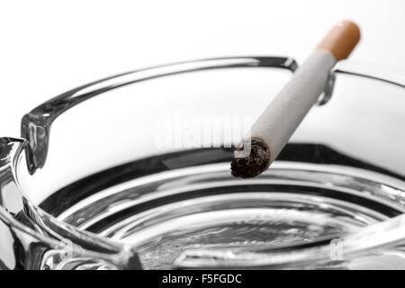 Cigarette on ashtray Stock Photo