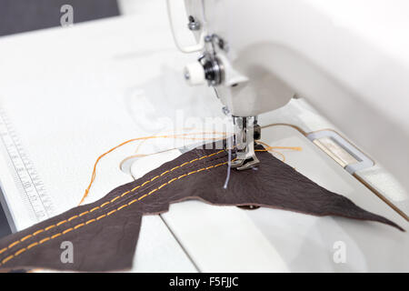 Sewing-machine working Stock Photo