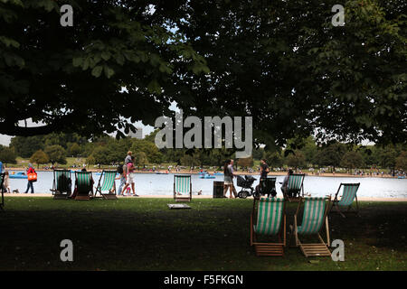 London, UK, UK. 12th Sep, 2011. People enjoy the warm summer weather, sunbathing or boating on the serpentine in Hyde Park. © Ruaridh Stewart/ZUMAPRESS.com/Alamy Live News Stock Photo