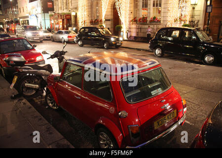 London, UK, UK. 12th Sep, 2011. An original model mini with a Union Jack British flag painted on the roof in London's city center at night. © Ruaridh Stewart/ZUMAPRESS.com/Alamy Live News Stock Photo