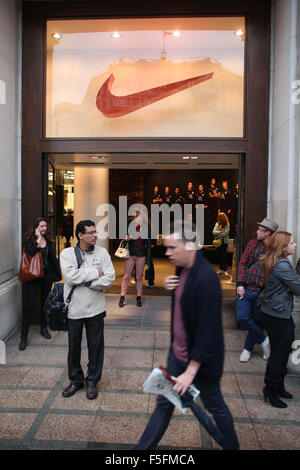 London, UK, UK. 12th Sep, 2011. People outside the Nike store in London, with a large red swoosh logo over the door. © Ruaridh Stewart/ZUMAPRESS.com/Alamy Live News Stock Photo