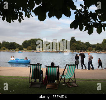 London, UK, UK. 12th Sep, 2011. People enjoy the warm summer weather, sunbathing or boating on the serpentine in Hyde Park. © Ruaridh Stewart/ZUMAPRESS.com/Alamy Live News Stock Photo