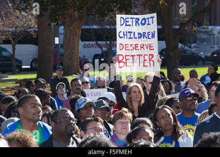 Lansing, Michigan USA. Emma Howland-Bolton joins teachers and other school workers from Detroit in a rally at the state capitol to oppose health care and other concessions demanded by the school district manager. The Detroit Public Schools have been run by state-appointed emergency managers for most of the past 15 years, during which enrollment has declined, class sizes have increased, and teachers have agreed to repeated concessions. Credit:  Jim West/Alamy Live News Stock Photo