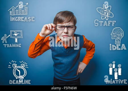 businessman boy in orange shirt holds hand glasses thumbnail ico Stock Photo