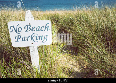 No parking sign on the beach. Environmental sustainability concept. Stock Photo