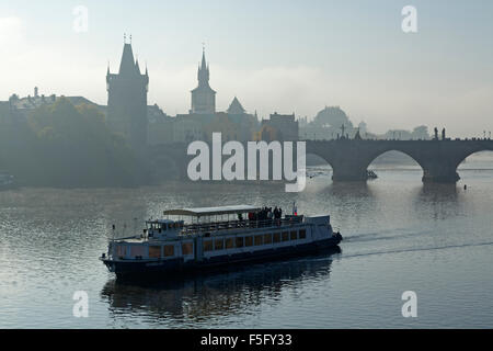 Charles Bridge (Karlův most) in early morning fog, Prague, Czech Republic Stock Photo