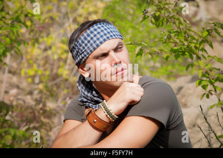 Portrait of an attractive young man on nature Stock Photo