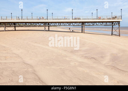 Skegness Pier and an almost empty beach, Skegness, Lincolnshire, England, UK Stock Photo