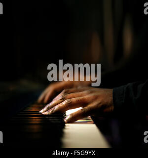 Hands of pianist playing synthesizer close-up Stock Photo