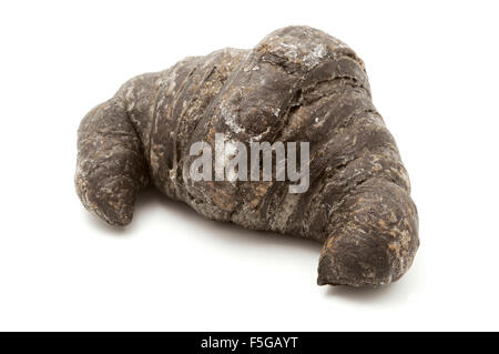 Black charcoal croissant on a white background Stock Photo