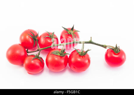 Cherry tomatoes isolated on white. Stock Photo