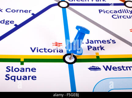 LONDON, UK - NOVEMBER 1ST 2015: A map pin marking the location of Victoria station on a London Underground Map, on 1st November Stock Photo