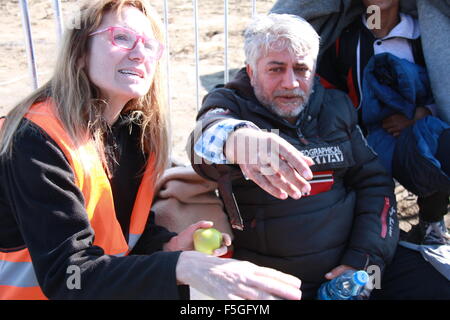 Czech team of volunteers also doctor Pavla Hrdlickova (left) help to thousands of migrants heading to Europe on Serbo-Croatian border Berkasovo - Bapska, on October 30, 2015. (CTK Photo/Sarka Mrazova) Stock Photo