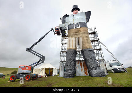 A giant Guy Fawkes measuring 58 foot, almost 18 meters, has been erected ahead of the famouse bonfire night celebrations in Lewes, East Sussex. Stock Photo