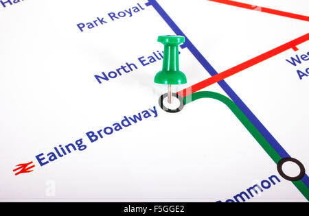 LONDON, UK - NOVEMBER 1ST 2015: A map pin marking the location of Ealing Broadway station on a London Underground Map, on 1st No Stock Photo