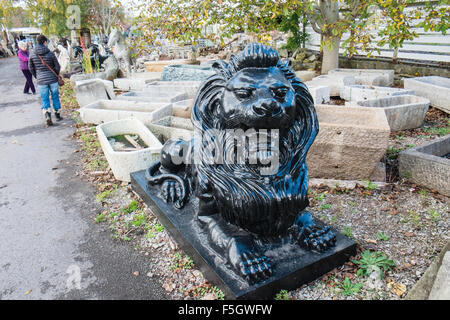 Huge, lion, statue, gate entrance.Wells,Reclamation,yard,recycling,Somerset,England, Stock Photo