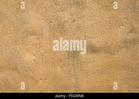 A structured background from brown plaster Stock Photo