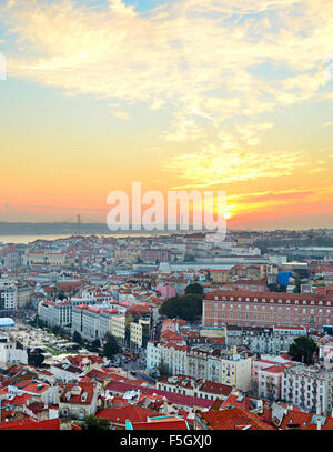 View of Lisbon city center and 25 April Bridge at sunset, Portugal