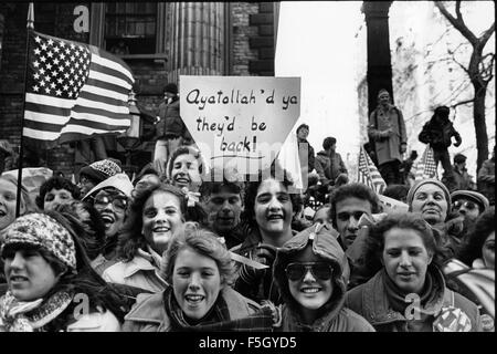 File. 4th Nov, 2015. Iran Hostage Crisis (November 4, 1979, to January 20, 1981) in which militants in Iran seized 66 American citizens at the U.S. embassy in Tehran, holding 52 of them hostage for more than a year. The crisis, which took place during the chaotic aftermath of Iran's Islamic revolution (1978-79) and its overthrow of the Pahlavi monarchy, had dramatic effects on domestic politics in the United States and poisoned U.S. Iranian relations for decades. Pictured: Nov 08, 1979 - Washington, District of Columbia, USA - Americans during a protest against the Iran Hostage Crisis 444 Stock Photo