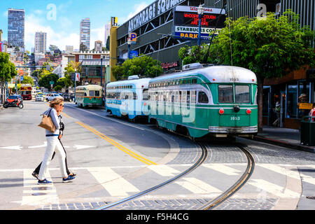 1940s heritage streetcars at the stop on Jones Street in the Fisherman's Wharf district of San Francisco CA Stock Photo