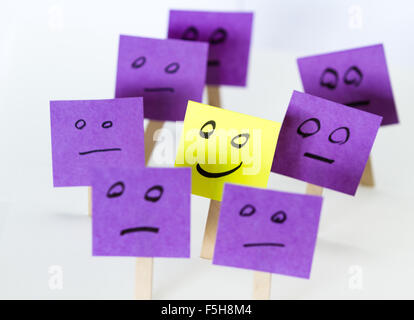 conceptual image for a be different or be happy concept using sticky notes Stock Photo