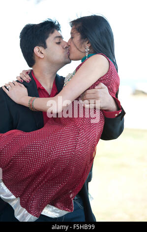Young Happy Indian Couple Kissing Stock Photo - Alamy