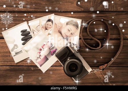 Composite image of positive young couple enjoying a back massage Stock Photo