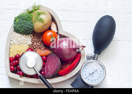 Healthy food in heart and lowering pressure sign concept Stock Photo