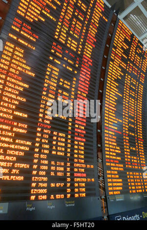 flights departure on electronic board Roissy Charles-de-Gaulle international airport France Stock Photo