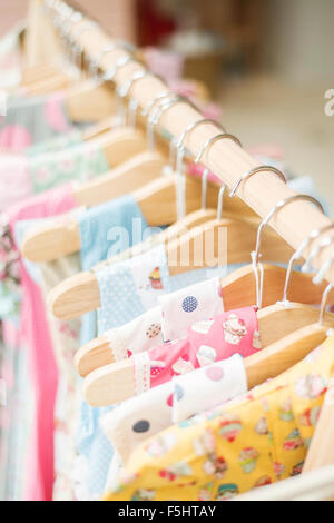 floral pattern young girl dresses in children wear fashion shop Stock Photo