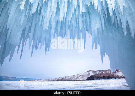 Ice cave near siberian lake Baikal in winter Stock Photo