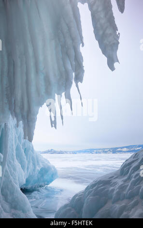 Ice cave near siberian lake Baikal in winter Stock Photo