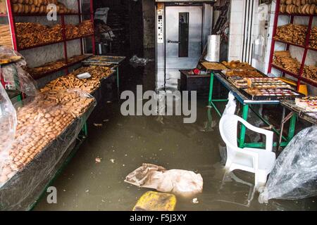 Alexandria, Alexandria, Egypt. 5th Nov, 2015. A bakery shop is seen flooded with rains water following a storm in Alexandria, Egypt, November 5, 2015. Eleven people were killed in floods in Beheira province north of Cairo, a security source said, and authorities evacuated 100 people from a village in the province as Egypt suffers from a second round of stormy weather in less than a month Credit:  Amr Sayed/APA Images/ZUMA Wire/Alamy Live News Stock Photo