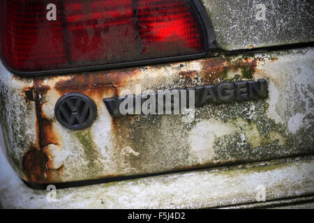 FILE - A file picture dated 23 September 2015 shows the VW badge on the back of an old Volkswagen Golf at a scrapyard in Wiesbaden, Germany. PHOTO: FREDRIK VON ERICHSEN/DPA Stock Photo